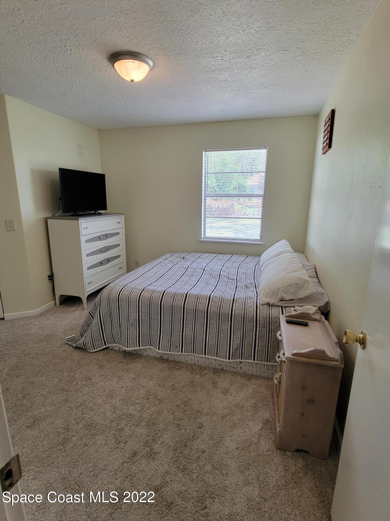 1435 Madison Road Northwest Palm Bay, FL 32907 - Photo 6 of 14 Master Bedroom 1