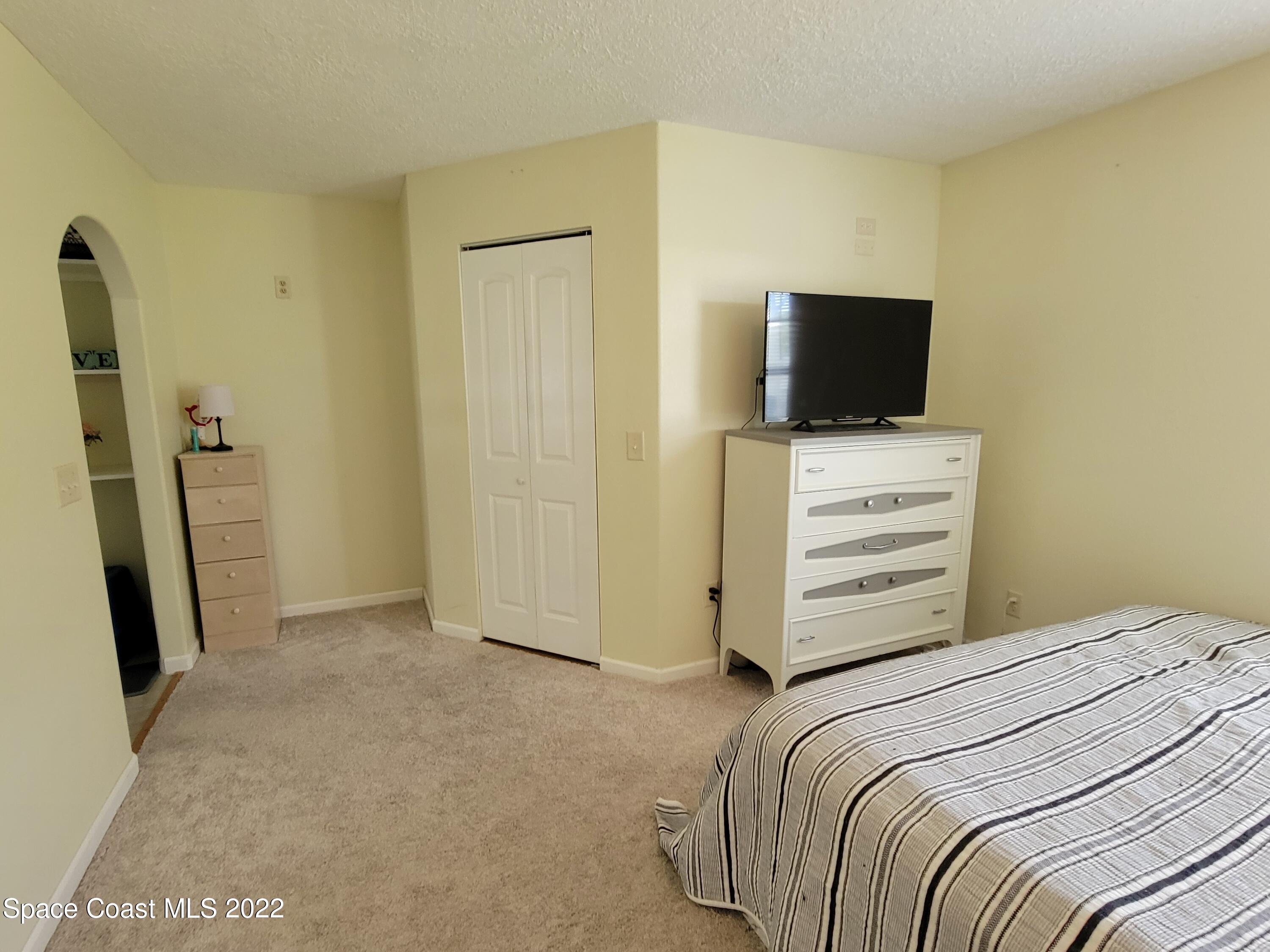 1435 Madison Road Northwest Palm Bay, FL 32907 - Photo 7 of 14 Master Bedroom