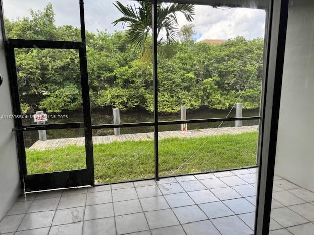 Coral Ridge Isles Fort Lauderdale, FL 33334 - Photo 14 of 17 a view of a yard from a window