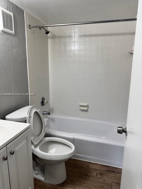 Coral Ridge Isles Fort Lauderdale, FL 33334 - Photo 6 of 17 a bathroom with a toilet and a bathtub