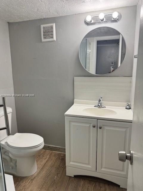Coral Ridge Isles Fort Lauderdale, FL 33334 - Photo 8 of 17 a bathroom with a toilet sink and mirror
