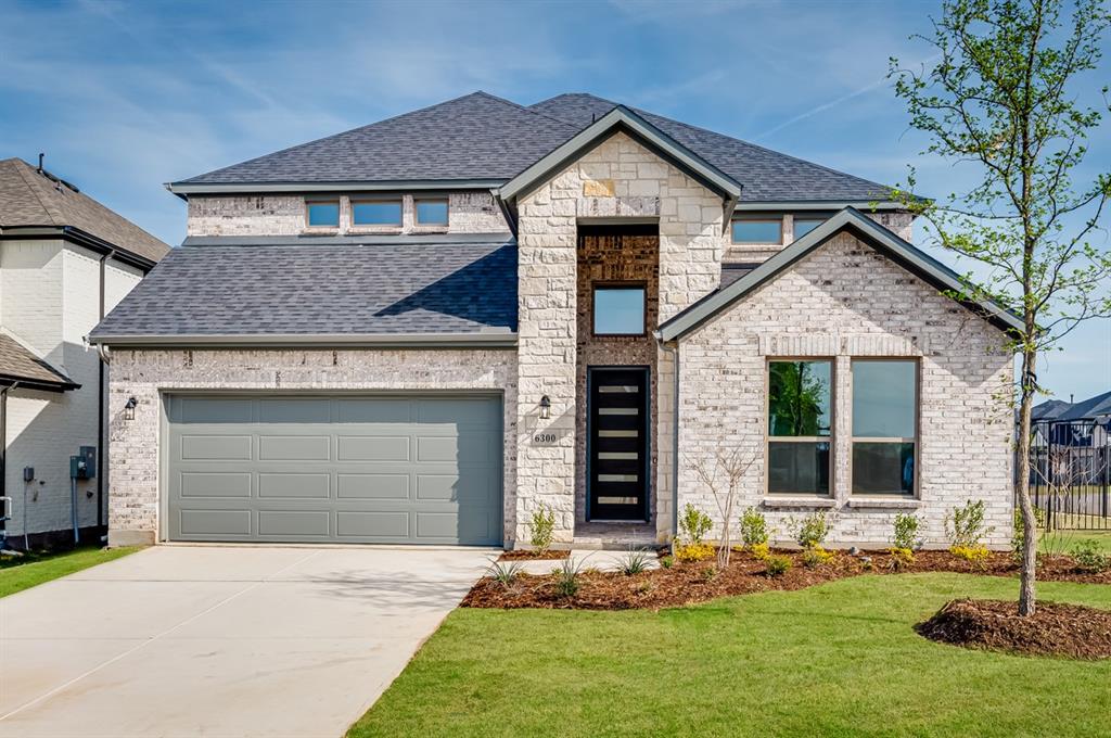 6300 Pinkston Drive McKinney, TX 75071 - Photo 1 of 1 a front view of a house with a yard and garage