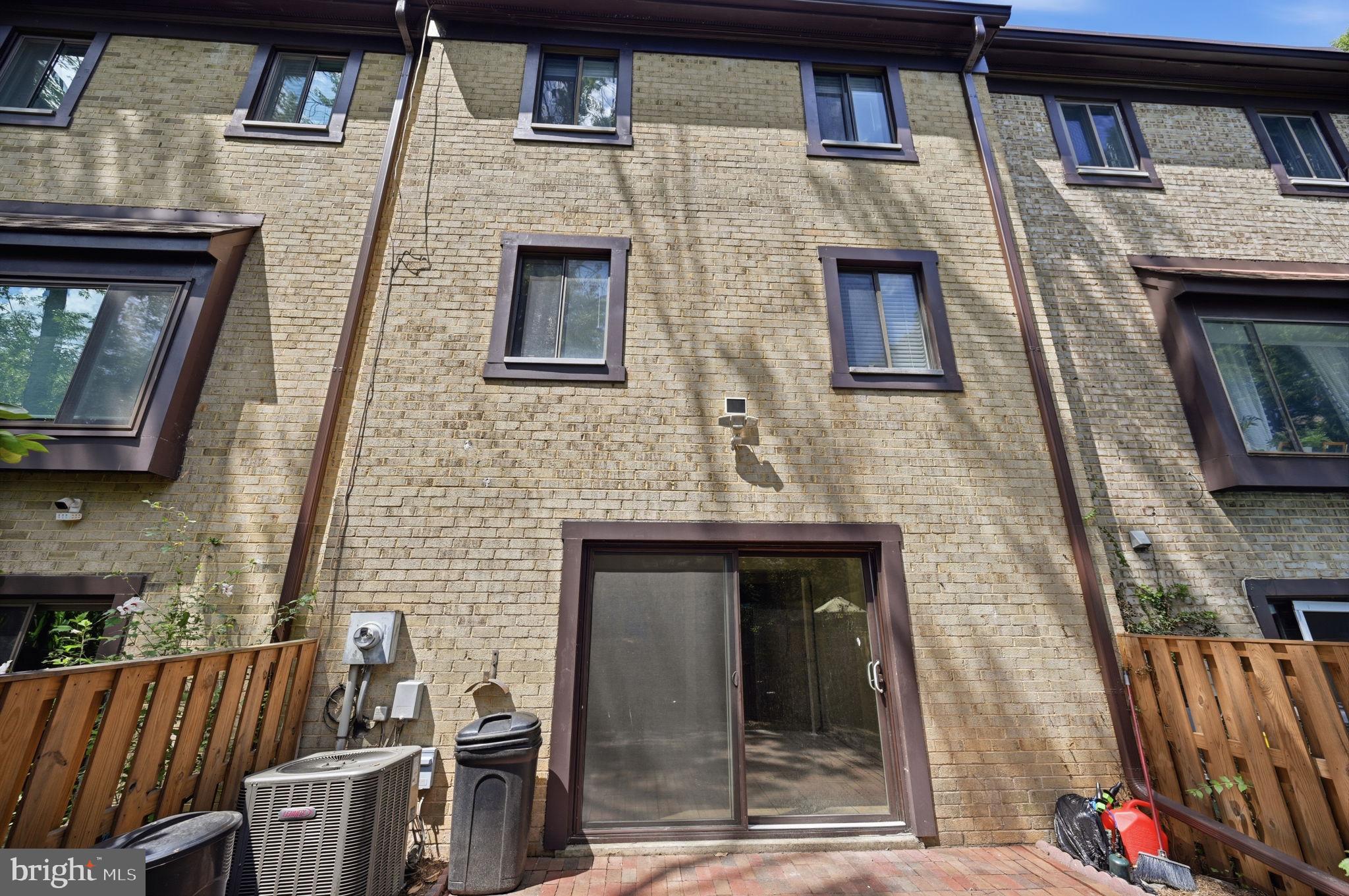 2908 Jermantown Road, Unit 24 Oakton, VA 22124 - Photo 65 of 74 Charming brick facade with private patio.