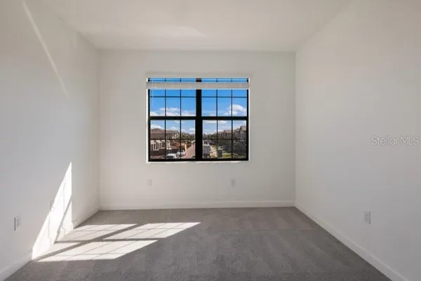 an empty room with windows