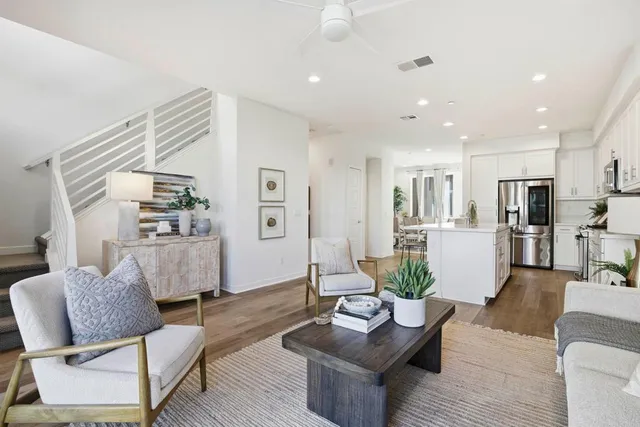 a view of a dining room with furniture and window