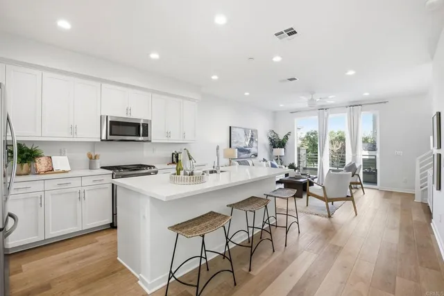 a bathroom with a sink a mirror and shower