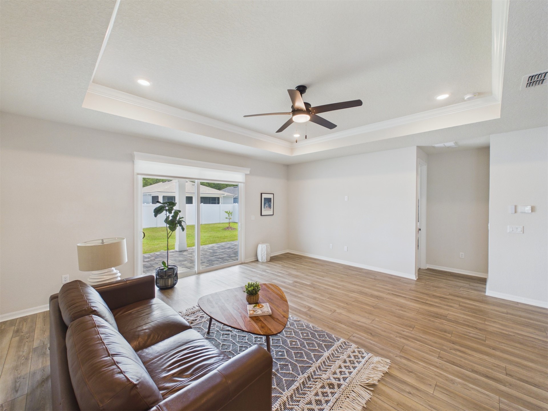 312 Salt Meadow Loop Yulee, FL 32097 - Photo 10 of 22 a living room with furniture and a rug