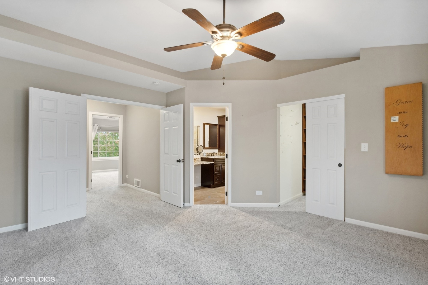 3443 Ravinia Circle Aurora, IL 60504 - Photo 14 of 36 a view of a livingroom with a ceiling fan and window