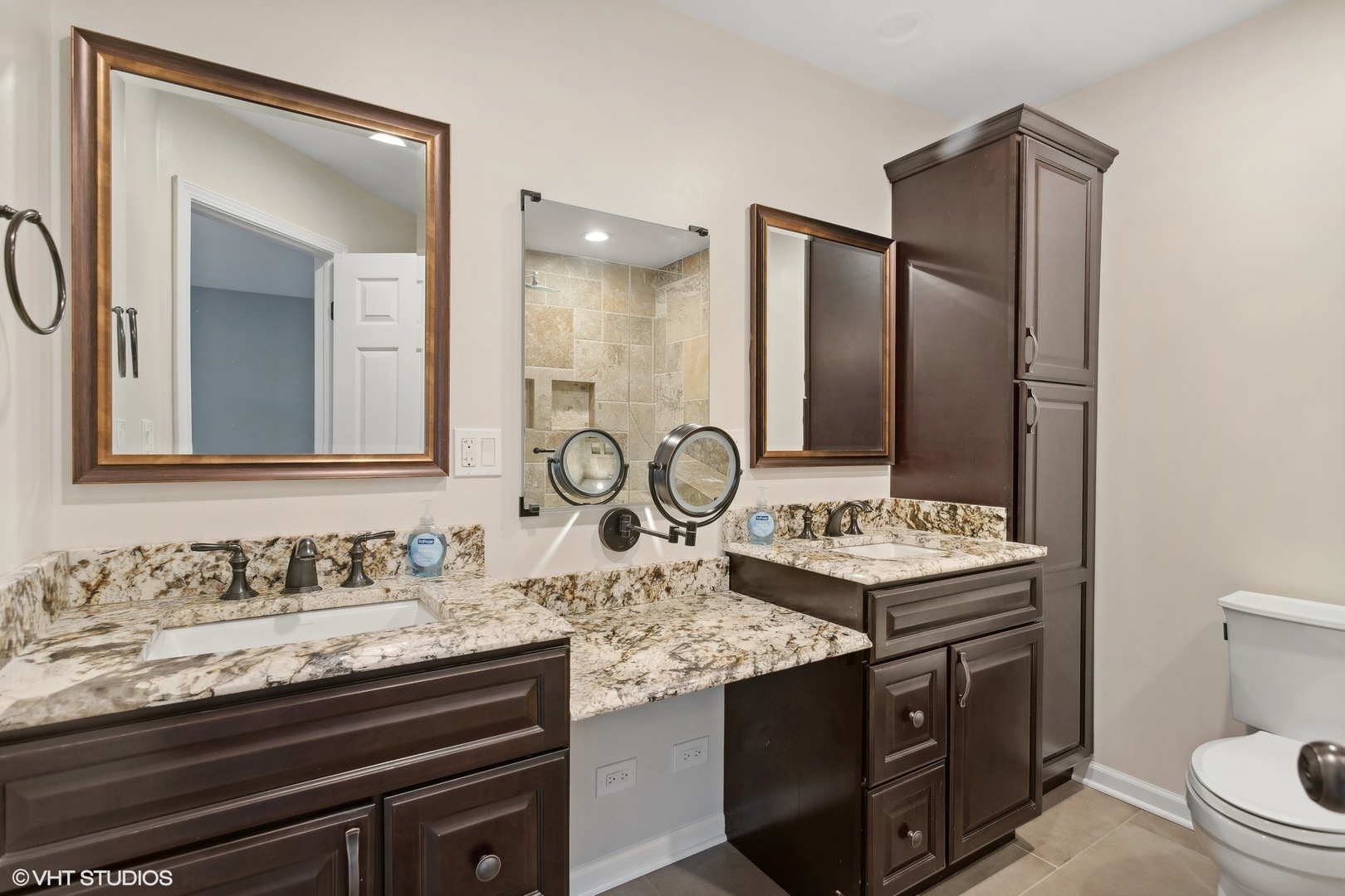 3443 Ravinia Circle Aurora, IL 60504 - Photo 16 of 36 a bathroom with a granite countertop sink a toilet and a mirror