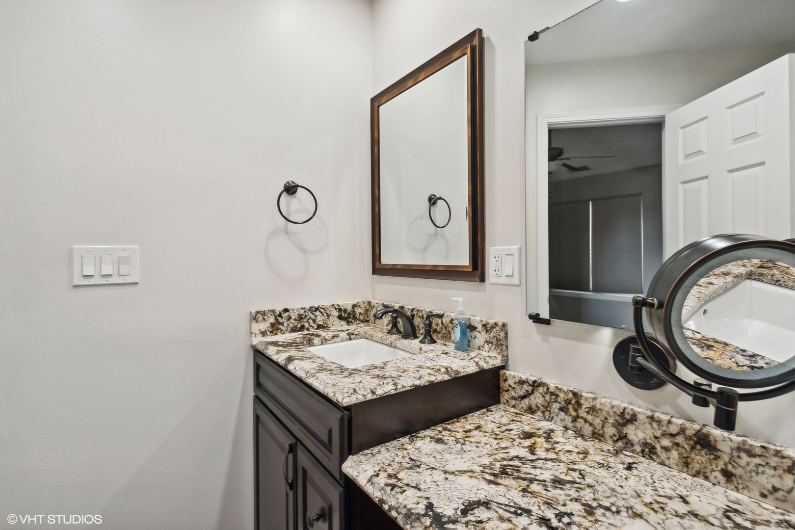 3443 Ravinia Circle Aurora, IL 60504 - Photo 17 of 36 a bathroom with a sink and a mirror