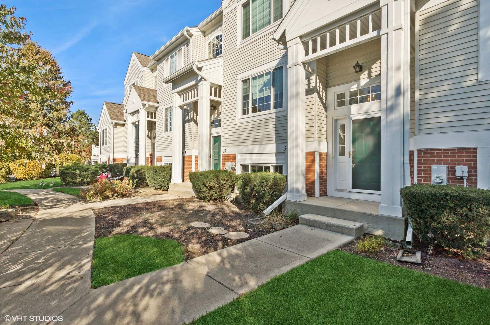 3443 Ravinia Circle Aurora, IL 60504 - Photo 2 of 36 a view of a building with a yard