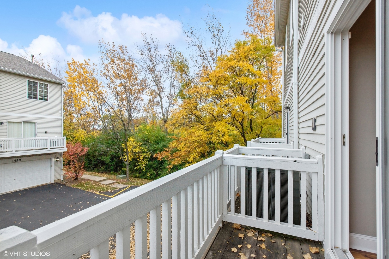 3443 Ravinia Circle Aurora, IL 60504 - Photo 34 of 36 a balcony view with a garden