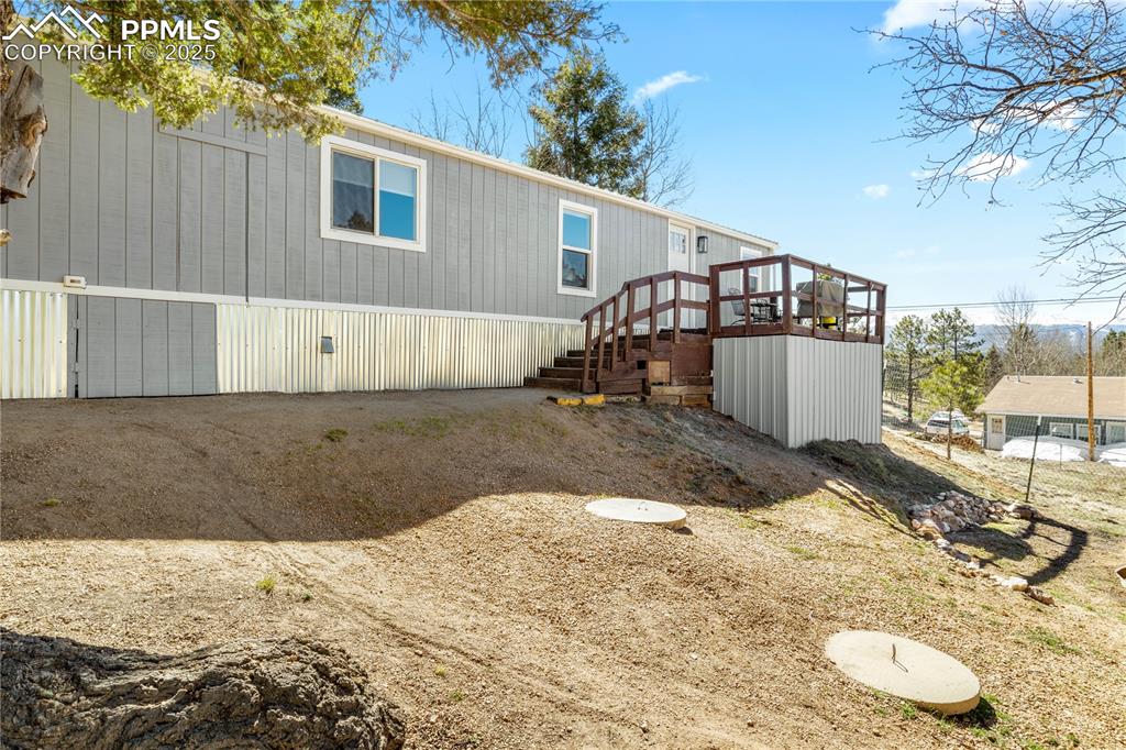 a view of a backyard of a house