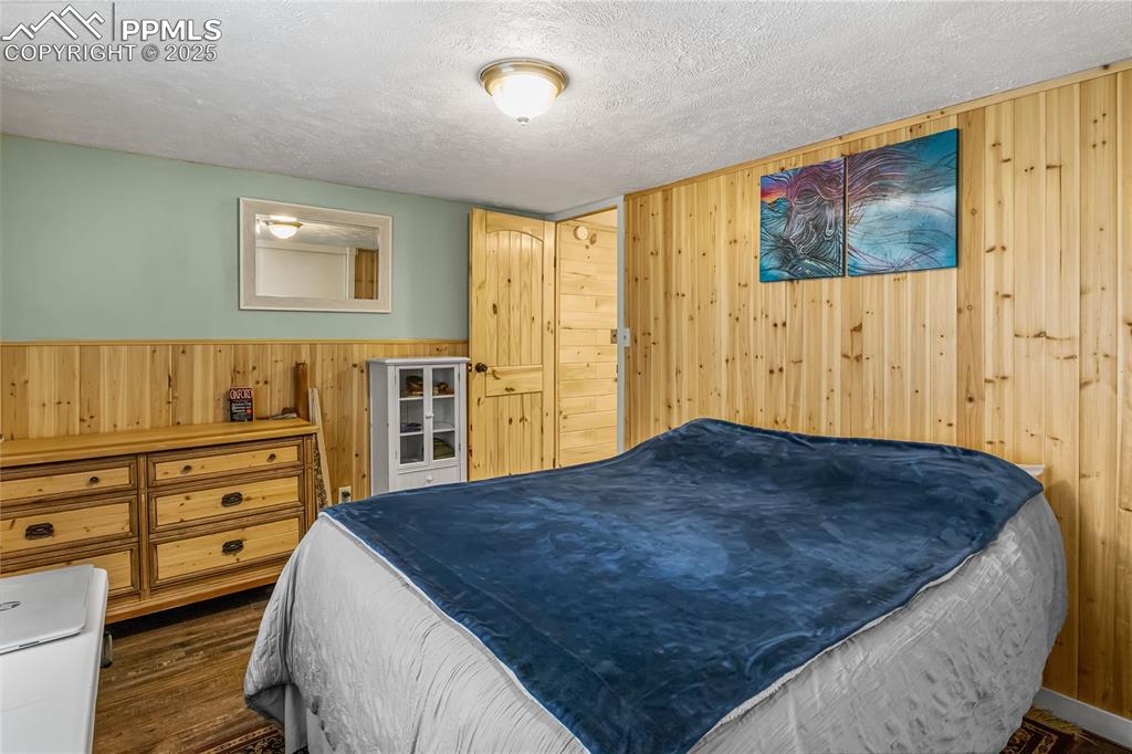 358 Fern Road Woodland Park, CO 80863 - Photo 12 of 17 a living room with a bed and furniture