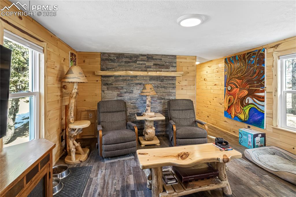 358 Fern Road Woodland Park, CO 80863 - Photo 2 of 17 a living room with furniture and wooden floor