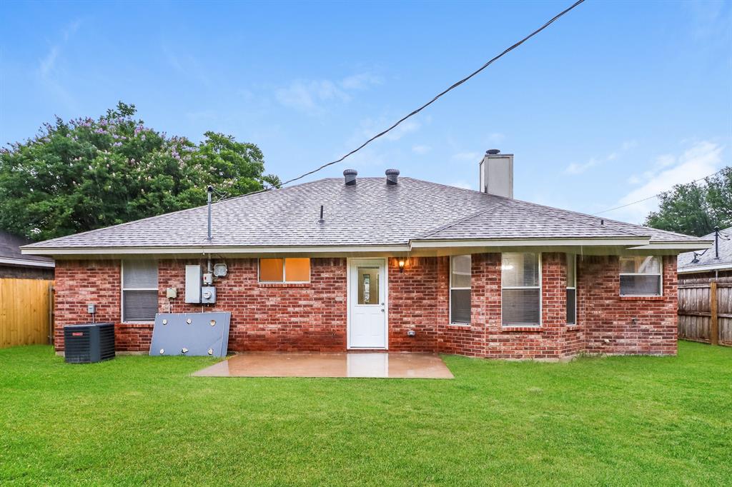 1772 Independence Road Blue Mound, TX 76131 - Photo 15 of 16 front view of a house with a yard