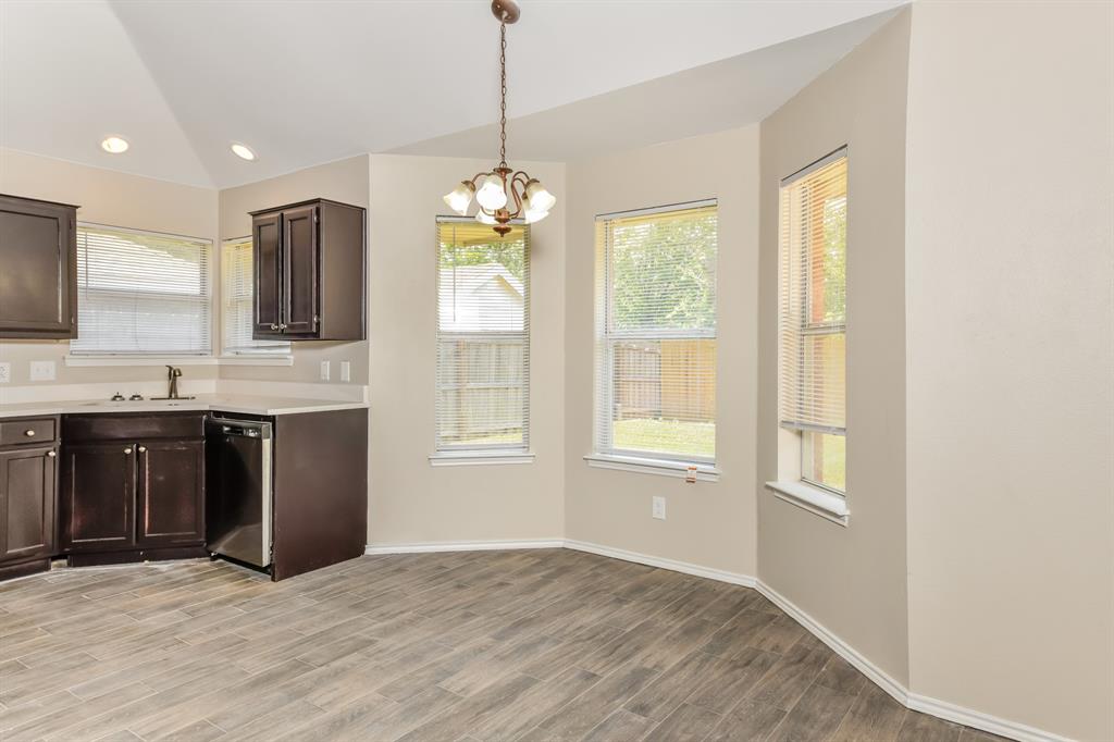1772 Independence Road Blue Mound, TX 76131 - Photo 4 of 16 a view of a kitchen counter top space and stainless steel appliances