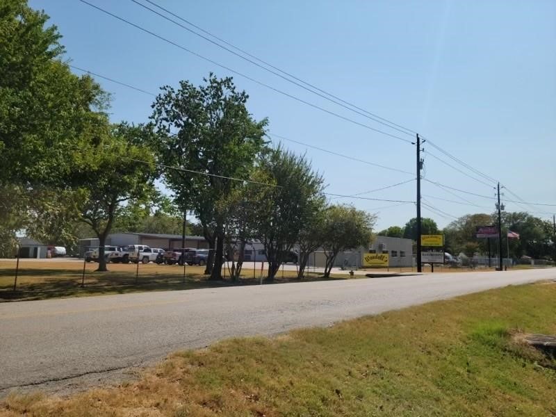 803 West Archer Road Baytown, TX 77521 - Photo 2 of 5 a view of street with tall buildings