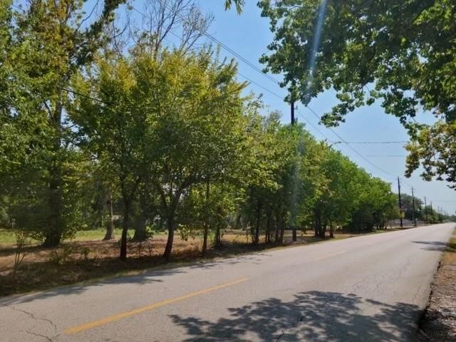 803 West Archer Road Baytown, TX 77521 - Photo 5 of 5 a view of a street with a tree