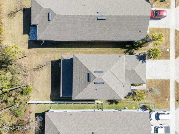 a view of house with a swimming pool