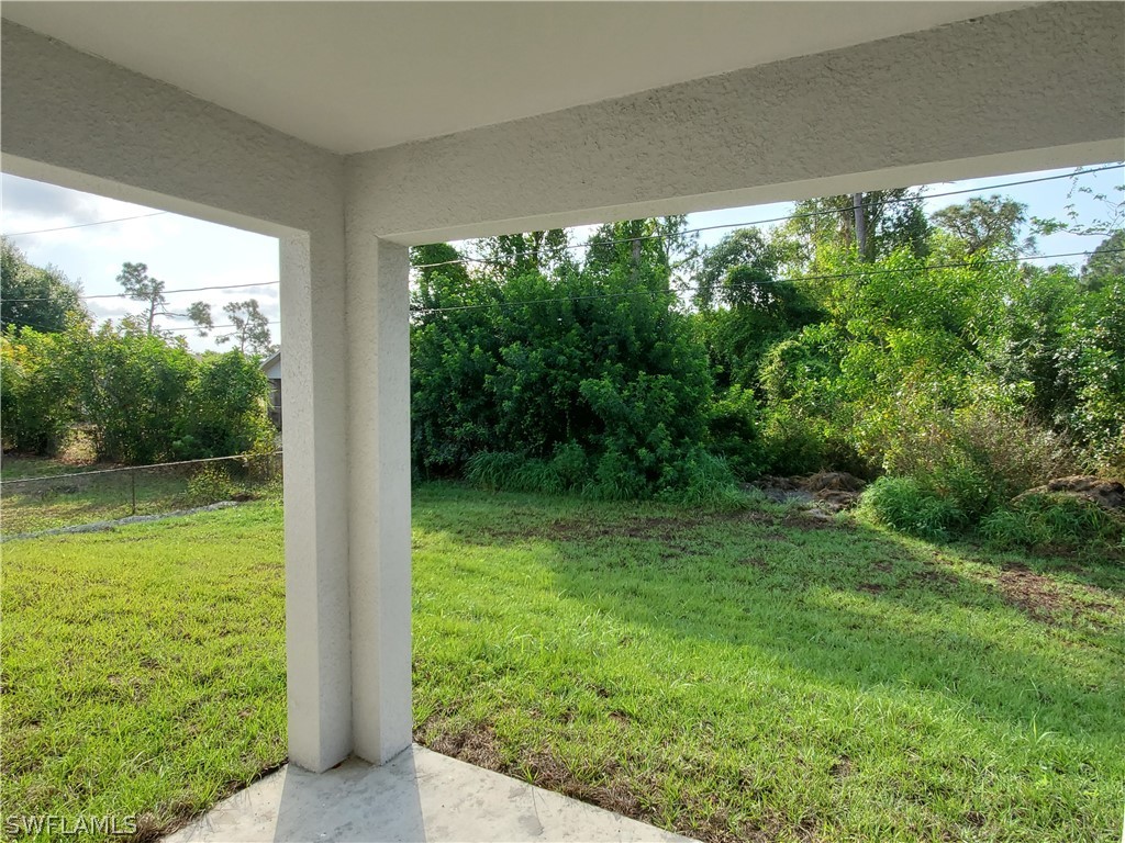 8072 Anhinga Road Fort Myers, FL 33967 - Photo 8 of 16 a view of a yard from a balcony
