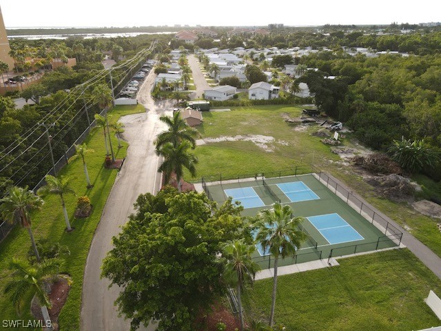 19681 Summerlin Road, Unit 324 Fort Myers, FL 33908 - Photo 6 of 10 an aerial view of residential houses with outdoor space