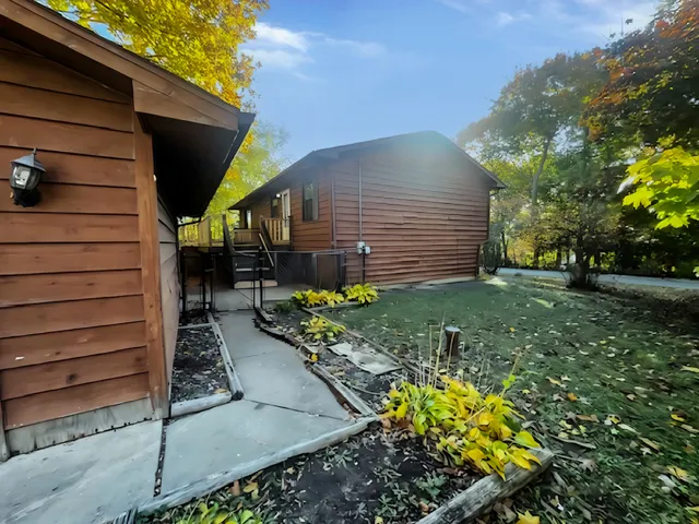 a backyard of a house with lots of green space