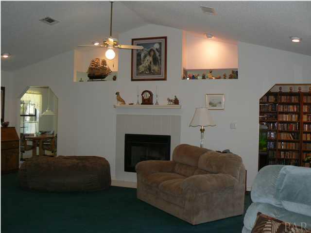 6545 Martin Road Milton, FL 32570 - Photo 6 of 18 Partial view of living room...notice archways on each side of fireplace, lighted plant ledges and recessed lighting
