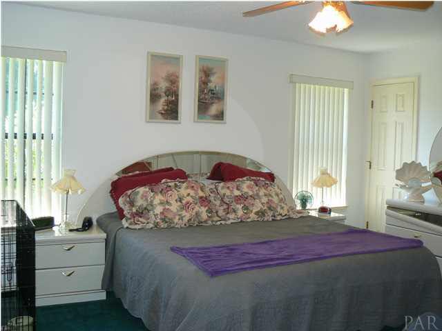6545 Martin Road Milton, FL 32570 - Photo 9 of 18 Partial view of Master bedroom, his and her closets were not captured in this photo.