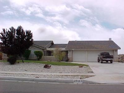 a car parked in front of a house