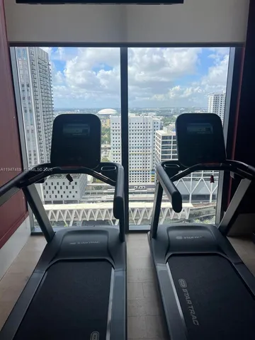 a view of a room with gym equipment
