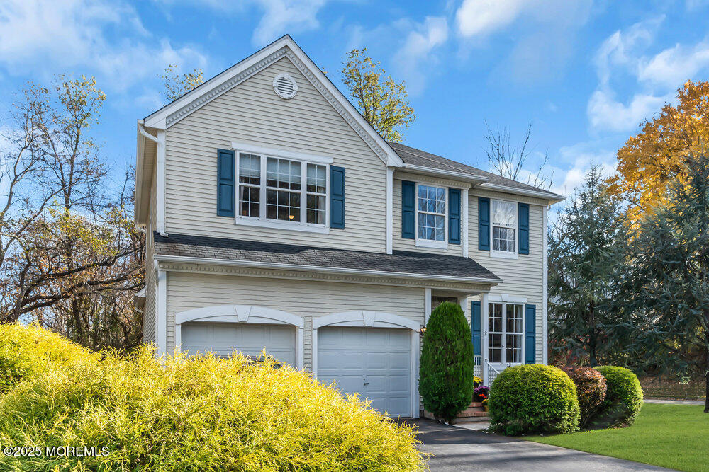 2 Blacksmith Pass Colts Neck, NJ 07722 - Photo 1 of 34 a front view of a house with garden