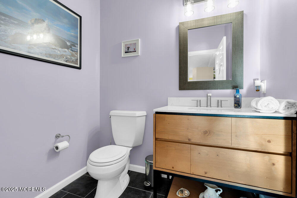 2 Blacksmith Pass Colts Neck, NJ 07722 - Photo 13 of 34 a bathroom with a toilet sink and mirror