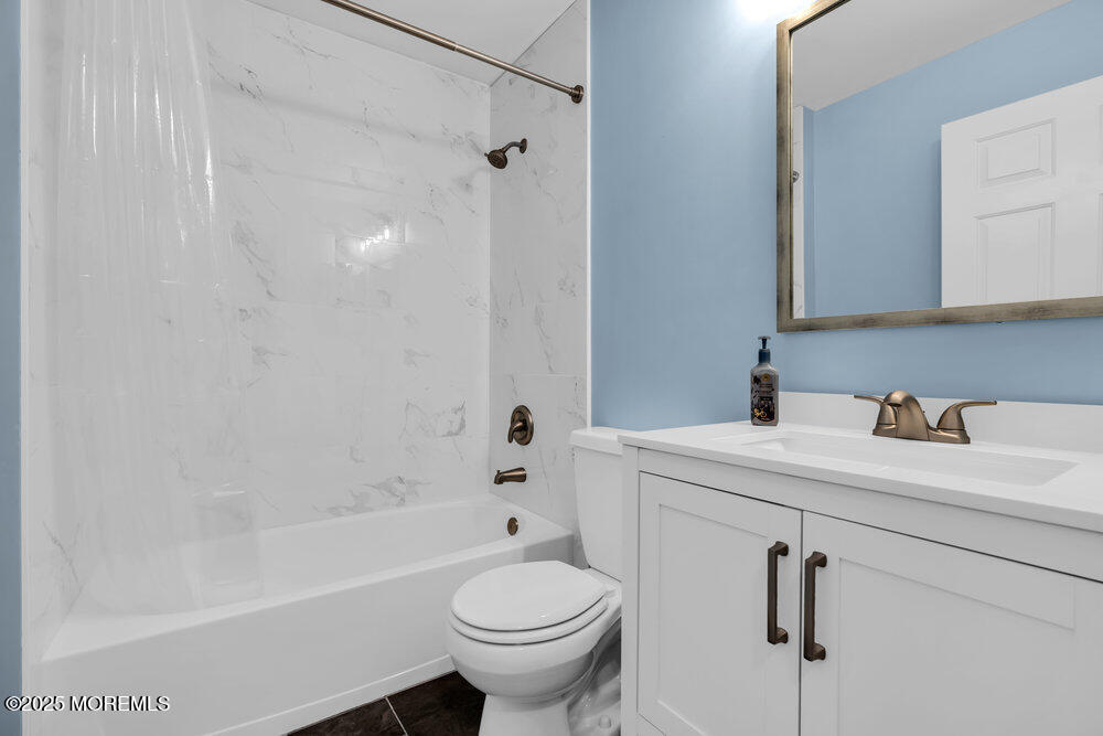 2 Blacksmith Pass Colts Neck, NJ 07722 - Photo 20 of 34 a bathroom with a sink toilet and shower