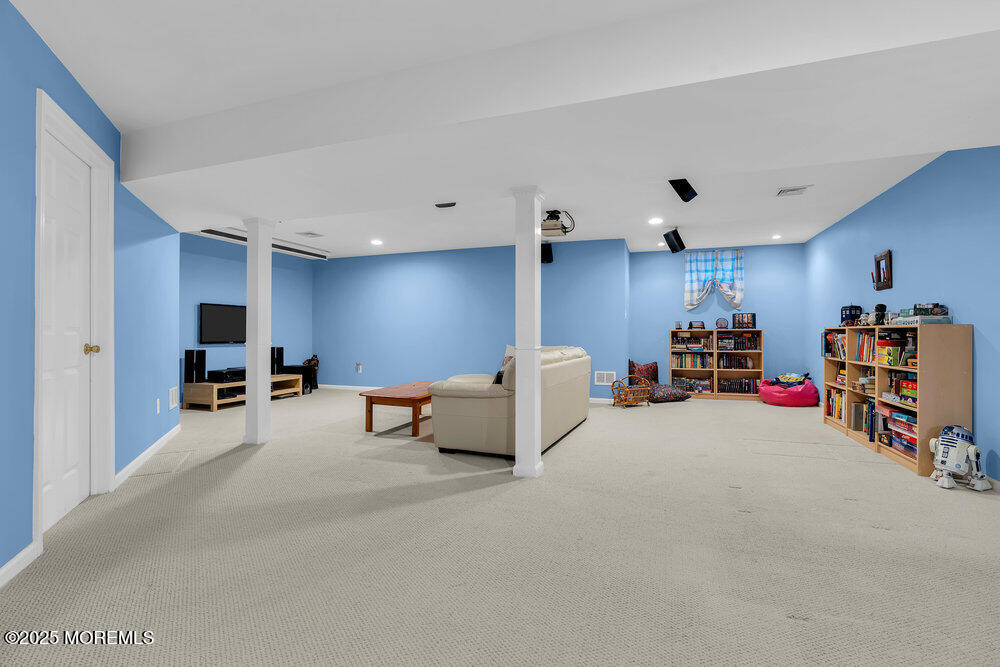 2 Blacksmith Pass Colts Neck, NJ 07722 - Photo 23 of 34 a room with furniture and a large window