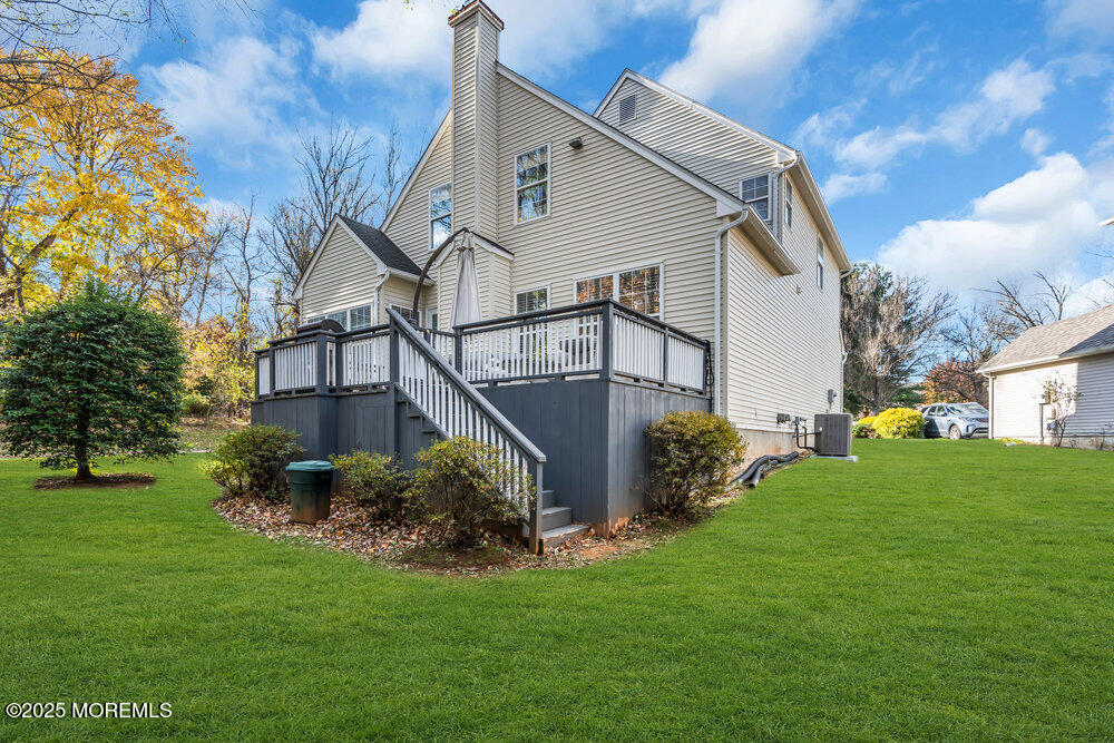 2 Blacksmith Pass Colts Neck, NJ 07722 - Photo 27 of 34 a view of a house with backyard and garden