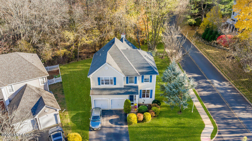 2 Blacksmith Pass Colts Neck, NJ 07722 - Photo 28 of 34 a aerial view of a house with swimming pool and garden
