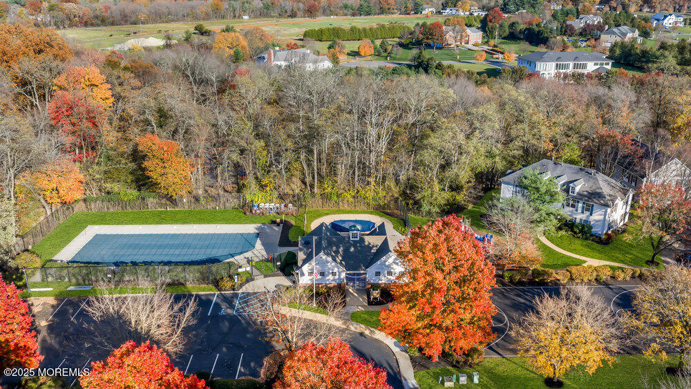 2 Blacksmith Pass Colts Neck, NJ 07722 - Photo 30 of 34 an aerial view of a house with a yard and lake view
