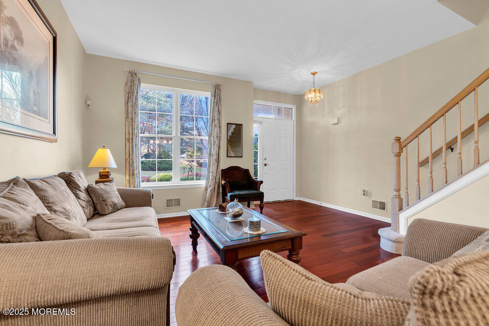 2 Blacksmith Pass Colts Neck, NJ 07722 - Photo 4 of 34 a living room with furniture and a window
