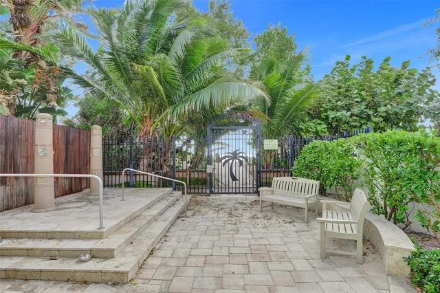a view of a garden from a balcony