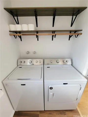 a utility room with dryer and washer