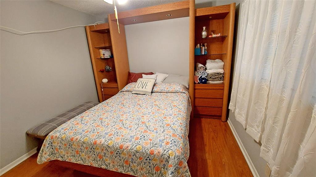 367 South Federal Highway, Unit C225 Deerfield Beach, FL 33441 - Photo 12 of 36 a bedroom with a bed and a window