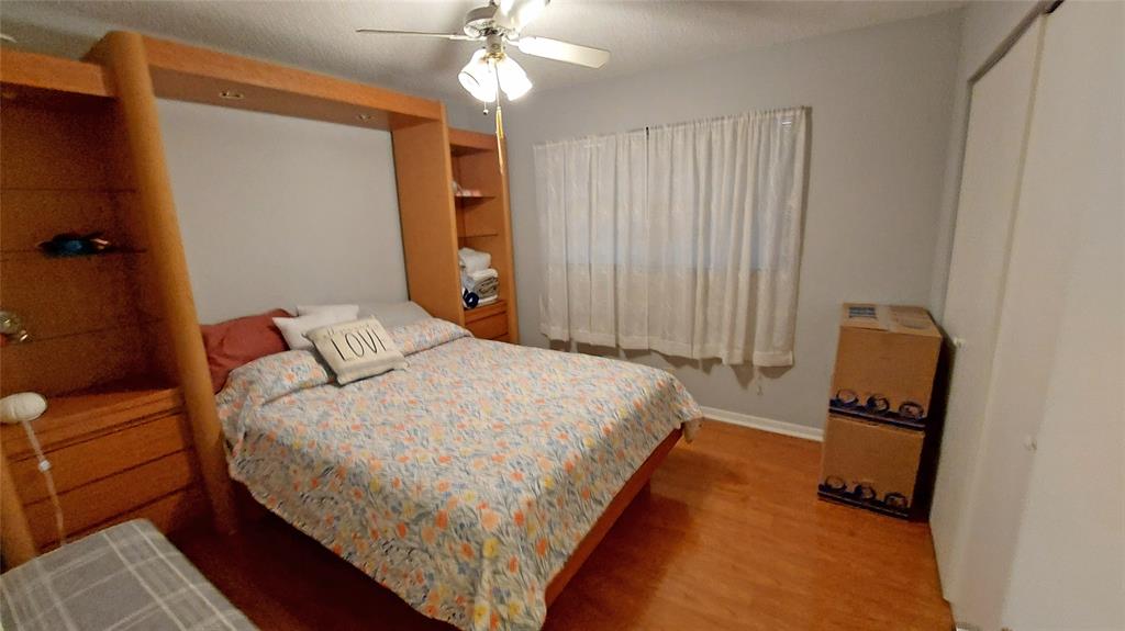 367 South Federal Highway, Unit C225 Deerfield Beach, FL 33441 - Photo 13 of 36 a bedroom with bed and mirror