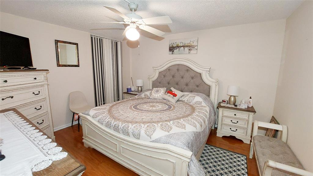 367 South Federal Highway, Unit C225 Deerfield Beach, FL 33441 - Photo 17 of 36 a living room with furniture and a flat screen tv