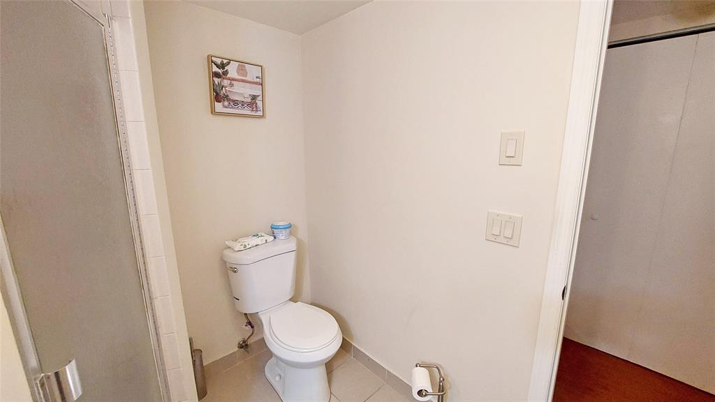 367 South Federal Highway, Unit C225 Deerfield Beach, FL 33441 - Photo 21 of 36 a white toilet sitting next to a white wall