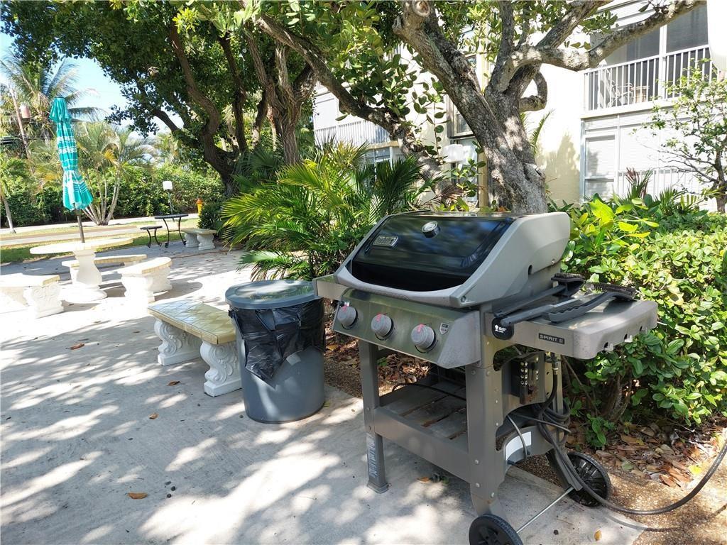 367 South Federal Highway, Unit C225 Deerfield Beach, FL 33441 - Photo 24 of 36 a view of a chairs and table in the patio