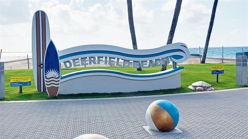 367 South Federal Highway, Unit C225 Deerfield Beach, FL 33441 - Photo 36 of 36 a picture of a table and chairs in the patio