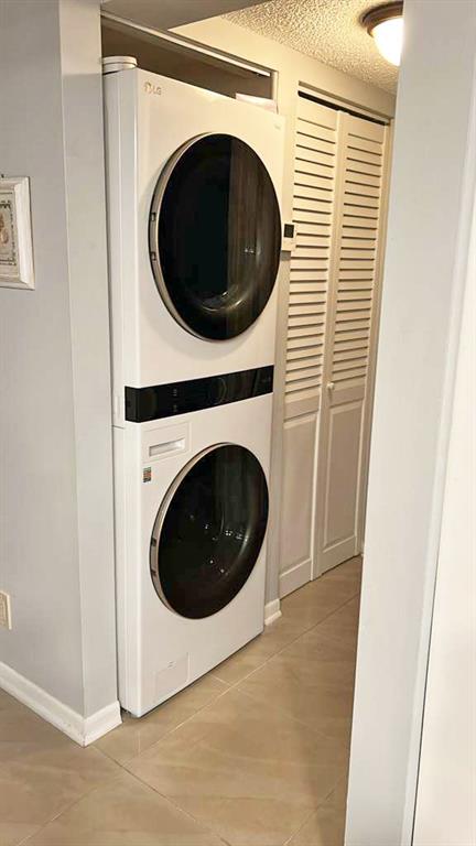 367 South Federal Highway, Unit C225 Deerfield Beach, FL 33441 - Photo 10 of 36 a utility room with dryer and washer