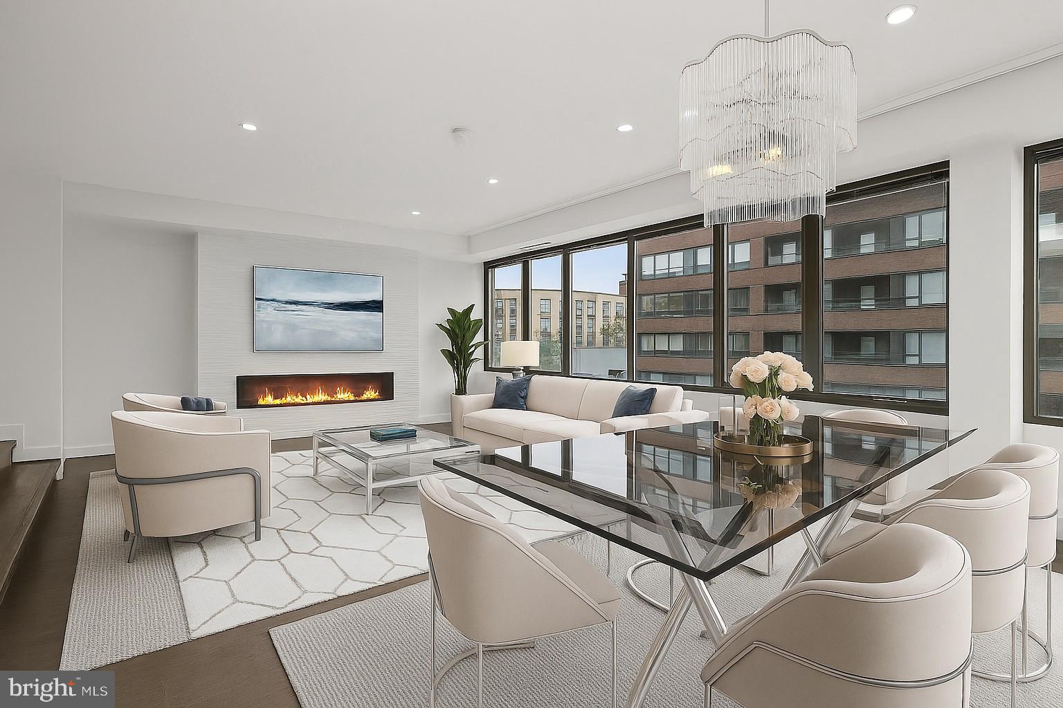 2501 M Street Northwest, Unit 612 Washington, DC 20037 - Photo 11 of 44 a living room with furniture and a flat screen tv