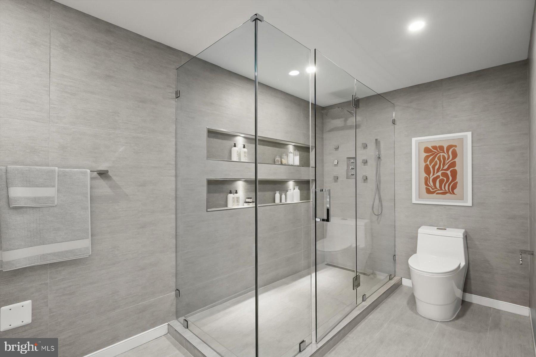 2501 M Street Northwest, Unit 612 Washington, DC 20037 - Photo 24 of 44 a bathroom with a shower and a toilet